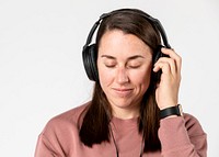 Brunette woman listening to music