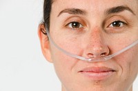 Sick female patient with a nasal cannula