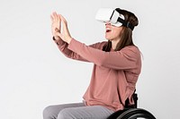 Cool girl in a wheelchair experiencing a VR headset