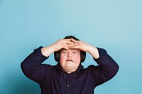 Cool young man with Down Syndrome listening to a sport podcast