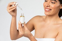Woman using a a dropper bottle mockup 