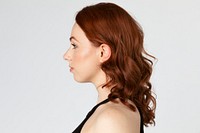 Red headed woman in a profile shot 