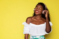 Woman listening to music through her headphones