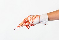 Doctor bloody hand in a glove holding a scalpel