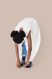 African American girl stretching her back mockup