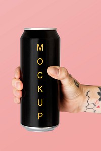 Hand holding a black aluminum can psd mockup