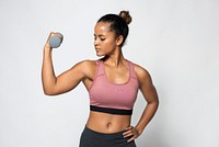 Sporty woman lifting dumbbell weights in a white background 