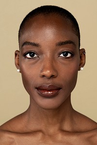 Black woman with a neutral facial expression