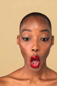 Shocked black woman wearing red lipstick 