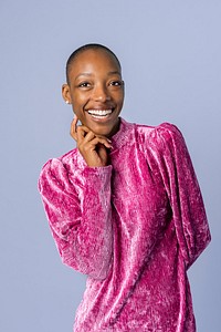 Happy black woman in a pink dress 