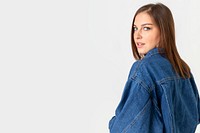 Beautiful young woman wearing a denim jacket