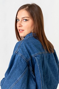 Beautiful young woman wearing denim jacket