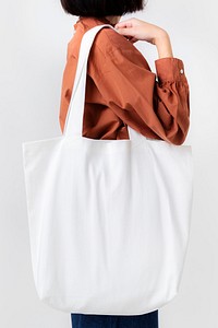 Woman with a white tote bag
