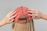 Woman wearing a red cap 