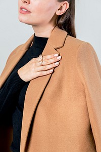 Glamourous woman wearing a brown coat