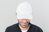 Happy man wearing a white cap 