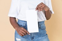 Woman showing a blank flyer