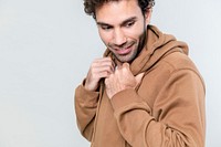 Man in a brown hoodie isolated on white background