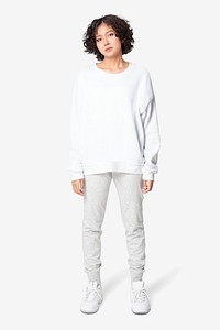 Woman in white basic sweater casual apparel full body