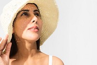 Indian woman wearing a straw sun hat