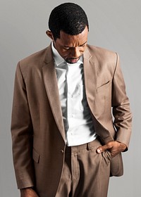 African American man wearing brown suit