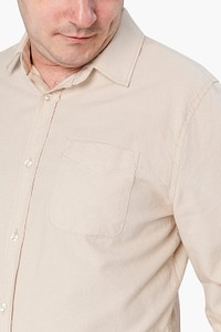 Man wearing beige long-sleeve shirt close-up
