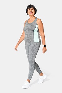 Senior woman in gray tank top and leggings sportswear fashion full body