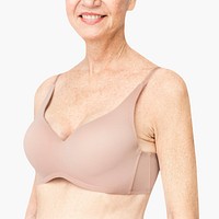 Senior woman in nude bra with design space