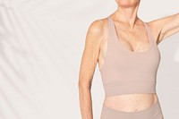 Women’s beige sports bra senior activewear with design space close up