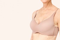 Senior woman in nude bra with design space