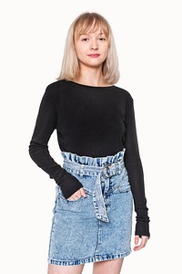Girls&rsquo; black sweater psd mockup with denim skirt for teenage apparel photoshoot