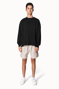 Teenage boy in black sweater winter apparel portrait