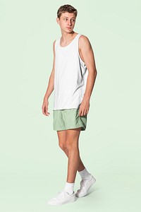 Teen&rsquo;s tank top mockup psd and green shorts summer apparel shoot
