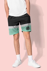 Black shorts psd mockup with OMG graphics for teenage apparel photoshoot