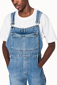 African American teen boy in denim dungarees streetwear apparel shoot