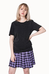 Blonde girl in black t-shirt and purple pleated skirt grunge fashion