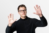 Man touching invisible screen psd with both hands mockup