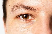 Man with smart brown eye color