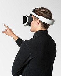 Man with VR headset pressing on an invisible screen