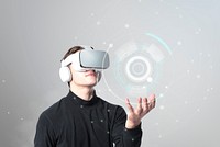 Man with VR goggles an on holographic data