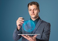 Businessman holding tablet mockup psd innovative future technology