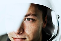 Male astronaut with glass helmet