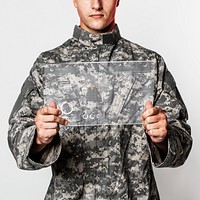 Military using transparent tablet mockup psd