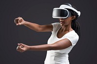 African American woman using virtual reality gadget for entertainment