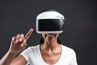 African American woman playing a virtual video game on virtual screen