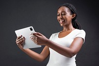 African American woman using digital tablet smart technology