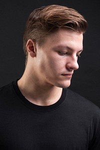 Closeup of young man in black t shirt