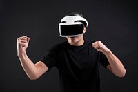 Man with VR playing boxing game entertainment technology