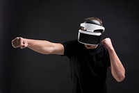 Man having virtual reality experience using VR headset