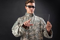 Military wearing smart glasses using virtual tablet army technology